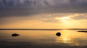 Preview wallpaper sea, stones, horizon, sky, sunset