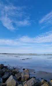 Preview wallpaper sea, stones, horizon, clouds, sky, nature