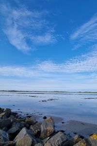 Preview wallpaper sea, stones, horizon, clouds, sky, nature