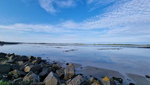 Preview wallpaper sea, stones, horizon, clouds, sky, nature