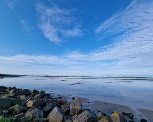 Preview wallpaper sea, stones, horizon, clouds, sky, nature