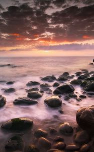 Preview wallpaper sea, stones, horizon, sunset