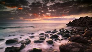 Preview wallpaper sea, stones, horizon, sunset