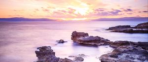 Preview wallpaper sea, stones, horizon, sky, clouds, nature