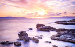 Preview wallpaper sea, stones, horizon, sky, clouds, nature