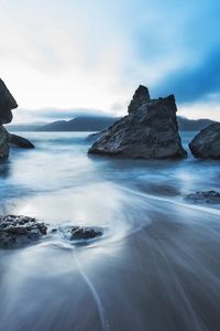 Preview wallpaper sea, stones, morning, fog, bridge, movement, stream