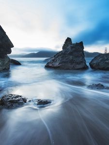 Preview wallpaper sea, stones, morning, fog, bridge, movement, stream