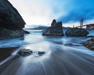 Preview wallpaper sea, stones, morning, fog, bridge, movement, stream