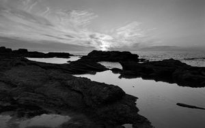 Preview wallpaper sea, stones, reefs, dark, black and white, nature