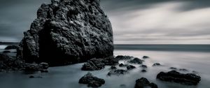 Preview wallpaper sea, stones, rocks, fog, horizon, clouds