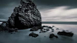 Preview wallpaper sea, stones, rocks, fog, horizon, clouds