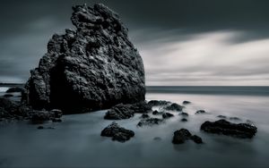 Preview wallpaper sea, stones, rocks, fog, horizon, clouds