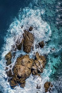 Preview wallpaper sea, stones, sea foam, aerial view, nature