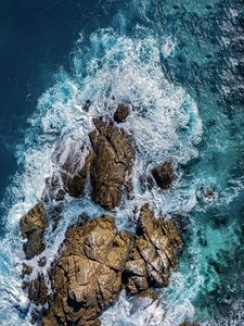 Preview wallpaper sea, stones, sea foam, aerial view, nature