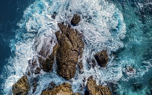 Preview wallpaper sea, stones, sea foam, aerial view, nature