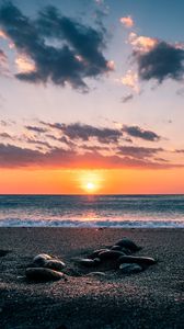 Preview wallpaper sea, stones, shore, horizon, sunset, sky