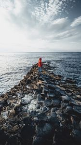 Preview wallpaper sea, stones, silhouette, waves, coast