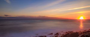 Preview wallpaper sea, stones, stone, coast, horizon, sunset