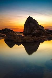 Preview wallpaper sea, stones, sunset, reflection