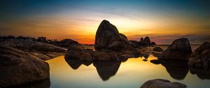Preview wallpaper sea, stones, sunset, reflection