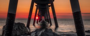 Preview wallpaper sea, stones, sunset, construction