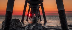 Preview wallpaper sea, stones, sunset, construction