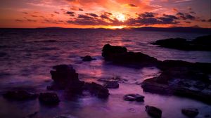 Preview wallpaper sea, stones, sunset, clouds