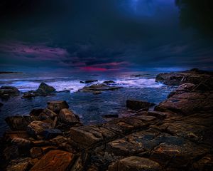 Preview wallpaper sea, stones, thunderstorm, clouds, dark