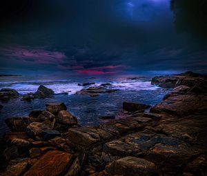 Preview wallpaper sea, stones, thunderstorm, clouds, dark