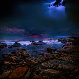 Preview wallpaper sea, stones, thunderstorm, clouds, dark