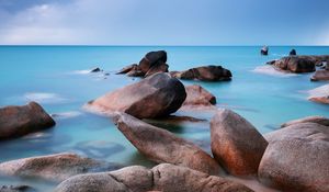 Preview wallpaper sea, stones, water, smooth surface