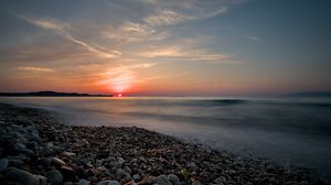 Preview wallpaper sea, sunrise, pebbles, shore, horizon