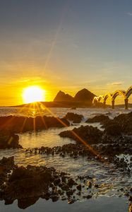 Preview wallpaper sea, sunrise, rocks, bridge, nature