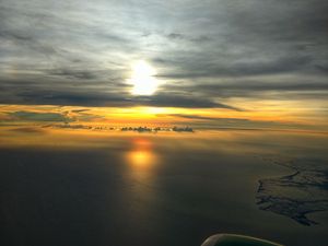 Preview wallpaper sea, sunset, aerial view, clouds, overview, height