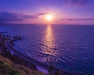 Preview wallpaper sea, sunset, bridge, horizon, purple, lilac