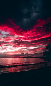 Preview wallpaper sea, sunset, clouds, night, shore