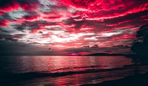 Preview wallpaper sea, sunset, clouds, night, shore