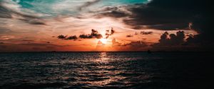 Preview wallpaper sea, sunset, clouds, dusk, waves