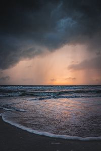 Preview wallpaper sea, sunset, clouds, waves, rain