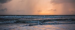Preview wallpaper sea, sunset, clouds, waves, rain