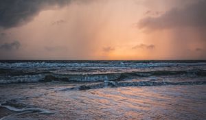 Preview wallpaper sea, sunset, clouds, waves, rain