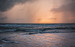 Preview wallpaper sea, sunset, clouds, waves, rain