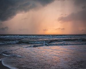 Preview wallpaper sea, sunset, clouds, waves, rain