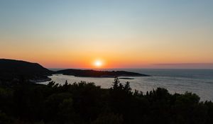 Preview wallpaper sea, sunset, horizon, island, landscape, nature