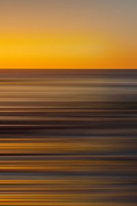 Preview wallpaper sea, sunset, horizon, blur, long exposure