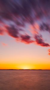 Preview wallpaper sea, sunset, horizon, blur, long exposure, dusk
