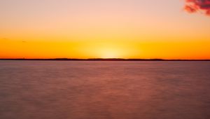 Preview wallpaper sea, sunset, horizon, blur, long exposure, dusk