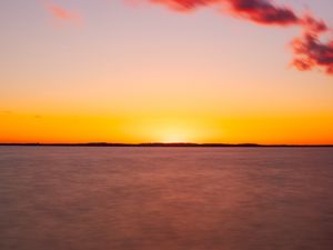 Preview wallpaper sea, sunset, horizon, blur, long exposure, dusk