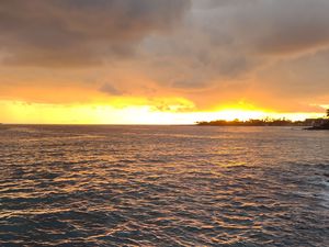 Preview wallpaper sea, sunset, horizon, pebbles