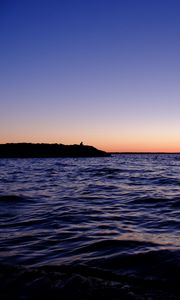 Preview wallpaper sea, sunset, loneliness, alone, silhouette, rocks